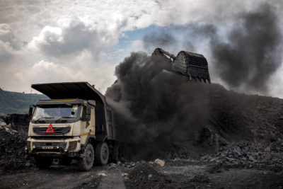 煤炭is loaded onto a truck at an open-pit mine near Dhanbad, India, in September.
